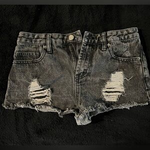 Size 25, Forever 21 black ripped shorts.